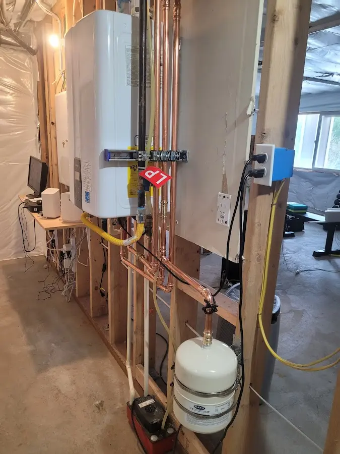 Licensed plumber repairing a kitchen sink in Riverside